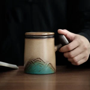 handcrafted 3d mountain relief ceramic tea infuser mug with built in filter