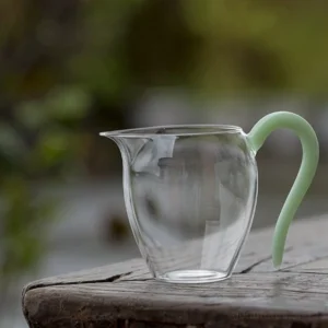7.4oz mini glass gong dao bei with green mint handle tea pitcher front view