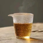 Full product view of 8.8oz frosted ice crack textured glass gong dao bei Chinese tea pitcher