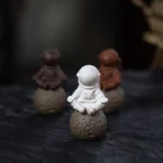 handcrafted yixing purple clay meditation astronaut tea pet front view