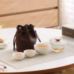 beige portable glass travel kung fu tea set with 3 ceramic cups and leather carry bag