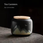 side view of 7.8oz black ceramic hand painted chinese landscape tea canister with golden metal lid
