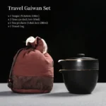 full unboxed view of black ceramic portable travel gaiwan tea set with cotton bag