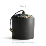 black portable ceramic tea canister with decorative fabric lid mini tea storage
