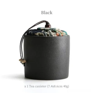 black portable ceramic tea canister with decorative fabric lid mini tea storage