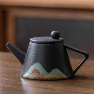 black variant handcrafted chinese mountain ceramic teapot with built-in filter