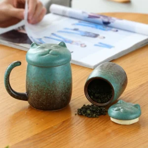 full set view of cute ceramic cat tea infuser mug with matching tea canister