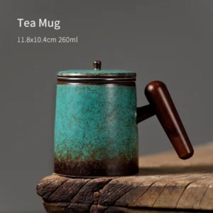 full product view of ceramic emerald tea infuser mug with wooden handle lid and infuser