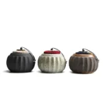 handcrafted ceramic pumpkin tea canister side view