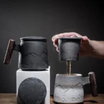 ceramic tea mug with infuser lid and wood handle main product view