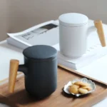 ceramic tea mug with infuser and wooden handle main product view