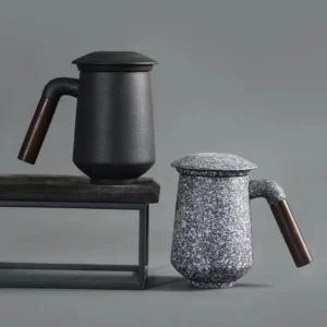 ceramic tea mug with built-in strainer and wood handle side view