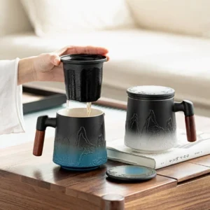ceramic tea mug with strainer lid and wood handle relief design