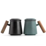 ceramic tea mug with tea strainer and wooden handle full product view