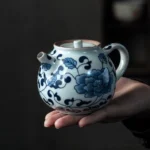 hand-painted traditional chinese blue and white porcelain teapot with floral motifs