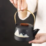 hand painted mountain landscape chinese ceramic teapot black matte with gold handle
