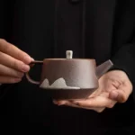chinese faraway mountain ceramic teapot main view dark brown with white mountain pattern