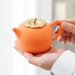 full set of chinese persimmon shape ceramic tea pot with cups and tray, overall view