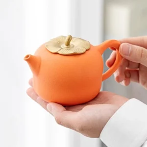 full set of chinese persimmon shape ceramic tea pot with cups and tray, overall view