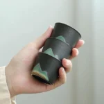 handcrafted 1.5oz chinese tea cup ceramic mountain design main view