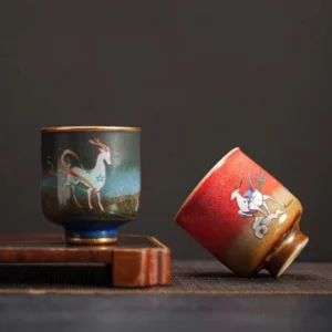 hand-painted chinese tea cup with lucky deer pattern gold trimmed ceramic