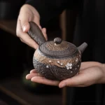 handcrafted chinese teapot with infuser side handle plum blossom decoration