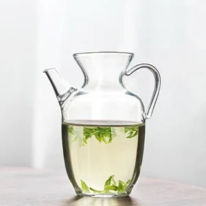 full main product view of 10.1oz clear handheld glass gong dao bei tea pitcher with built-in filter