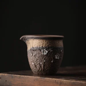 Handcrafted coarse pottery silver inlaid plum blossom gong dao bei tea pitcher full view