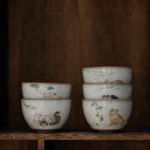 collection of different kawaii cat design ceramic chawan tea cups