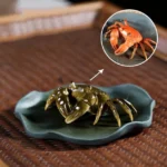 color changing crab purple clay tea pet on lotus leaf base main view