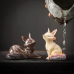 color changing fox tea pet set of lying and sitting up fox on tea table