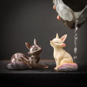 color changing fox tea pet set of lying and sitting up fox on tea table