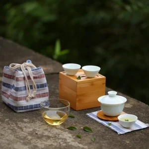 Complete portable 5.4oz ceramic travel tea set with plaid cloth carry bag, full set view