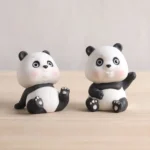 group of cute resin panda tea pet decorative figurines displayed together