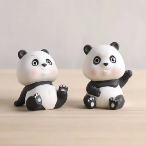 group of cute resin panda tea pet decorative figurines displayed together