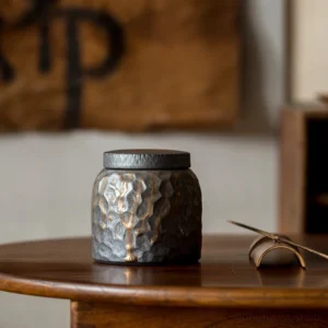 dark grey ceramic tea canister with gold hammered texture airtight loose tea storage