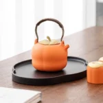 full set of chinese orange ceramic persimmon teapot with tea cups and tea tray