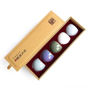 full set view of five great kilns style small chinese tea cups set in gift box