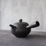 full side view of 17.6oz black ceramic chinese side handle teapot
