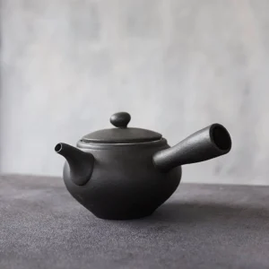 full side view of 17.6oz black ceramic chinese side handle teapot