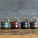 full view of handmade vintage chinese ceramic gourd teapot