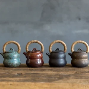 full view of handmade vintage chinese ceramic gourd teapot