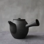full view of matte black chinese side handle ceramic teapot 12.2oz with built-in filter