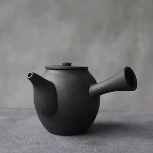 full view of matte black chinese side handle ceramic teapot 12.2oz with built-in filter