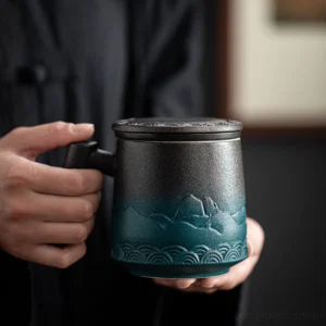 giant ceramic tea mug with infuser and lid mountain relief pattern