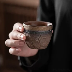 Hand carved lotus chinese tea cup rustic rough ceramic 3.4oz main view