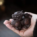 hand-carved purple clay qilin tea pet traditional chinese auspicious beast tea decor front view