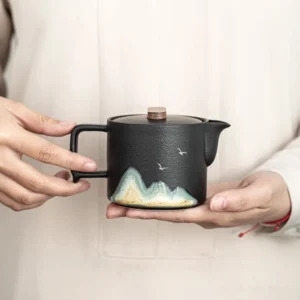8.1oz hand-painted black matte chinese teapot main view with natural wood accent
