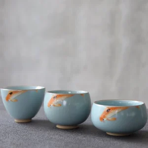 hand painted koi nian nian you yu chawan porcelain tea cup full product view