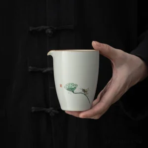 hand-painted lotus ceramic gong dao bei chinese tea pitcher side view